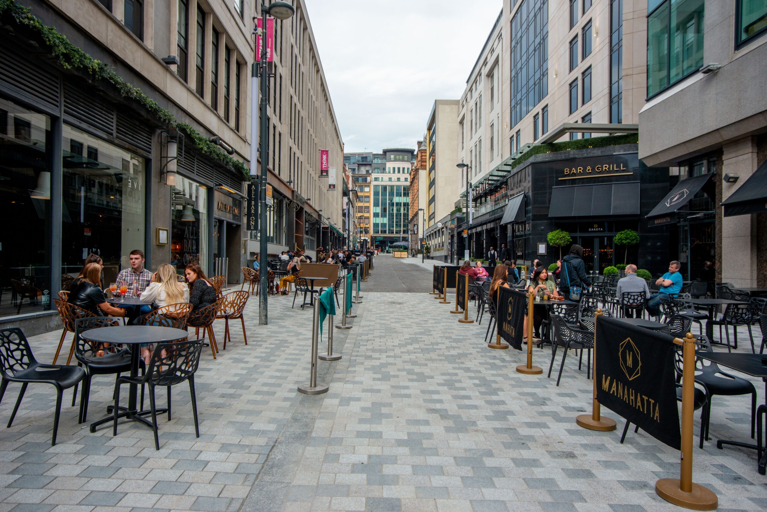 An image of the pedestrianised Greek Street in Leeds City Centre - shot from the Manahatta end